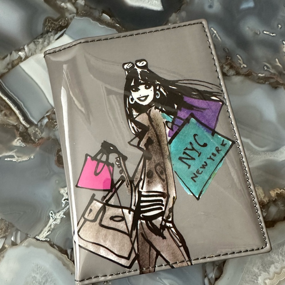 Passport holder. NYC-themed.